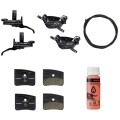 Complete Shimano Deore XT M8220 brake upgrade kit with levers, 4-piston calipers, hoses, finned pads, and oil